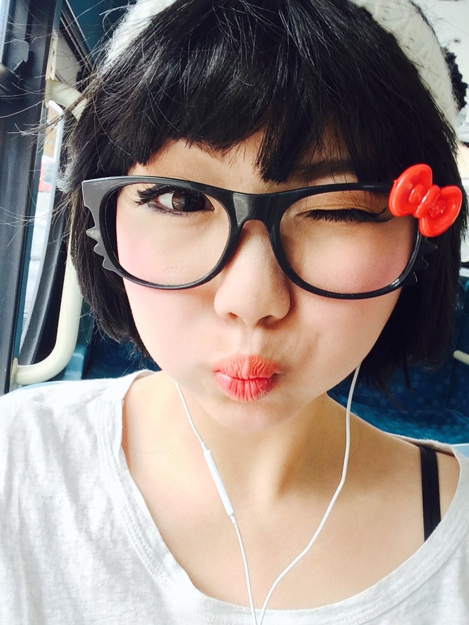 Cute short hair and glasses on the bus