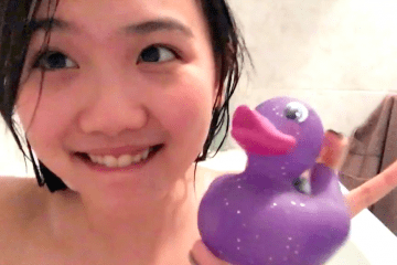 Asian teen bath show with iphone